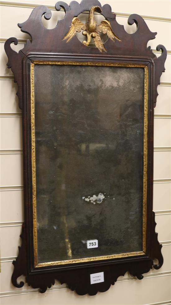 A George III parcel gilt mahogany fret frame wall mirror W.47cm